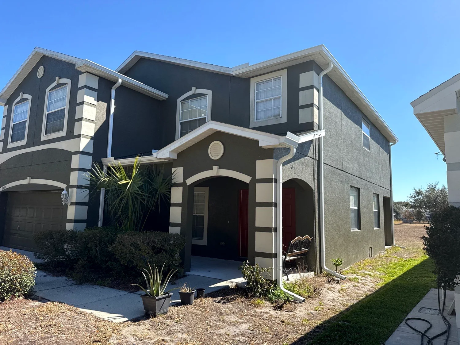 Gutters and downspouts installed together on a Central Florida home