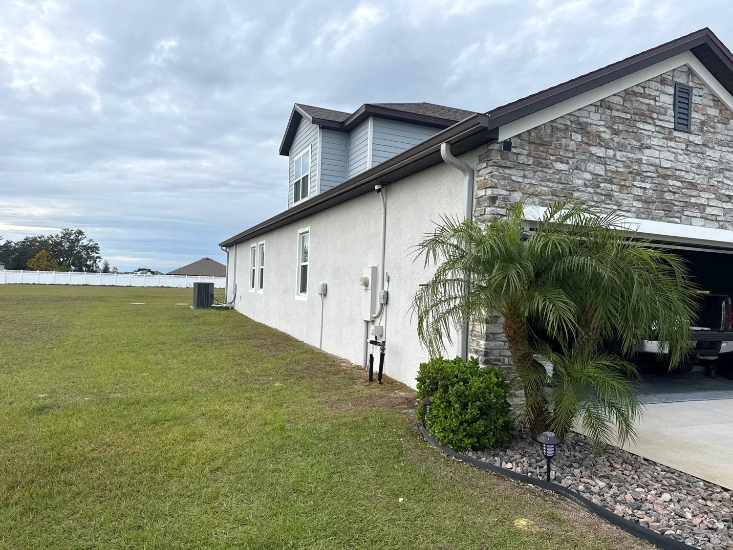 Gutter and drainage system along a Florida backyard